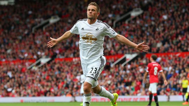 Gylfi Sigurdsson of Swansea City celebrates his Old Trafford winner.