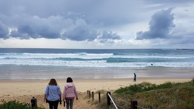 Off for a walk at Sawtell Beach.