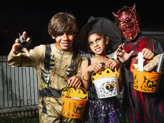 Trick or treating are (from left) Alwyn, Kitarna and Kyaal McCarthy on Halloween, Thursday, October 31, 2024. Picture: Kevin Farmer