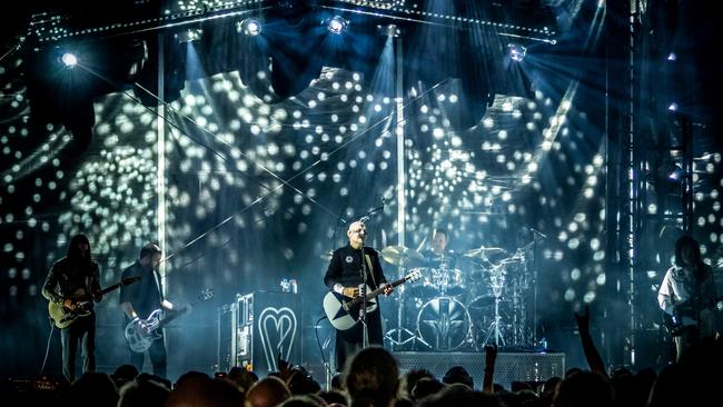 The Smashing Pumpkins, led by frontman Billy Corgan (centre), performing at Eatons Hill Hotel near Brisbane in April 2023. Picture: Andrew Treadwell