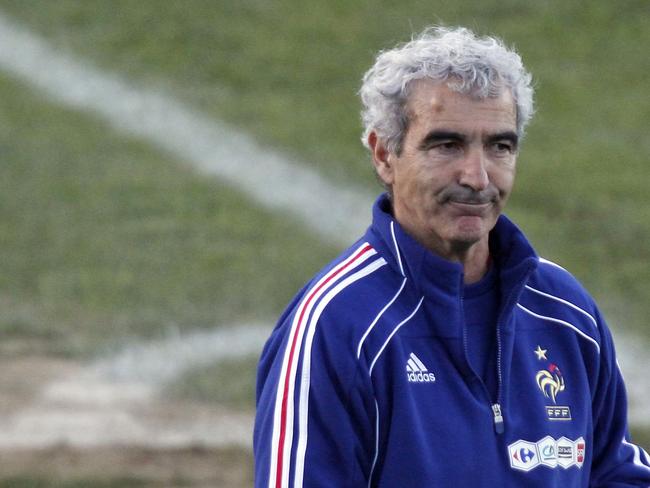 Domenech walks away after reading the letter of his players who decided to cancel the World Cup training session.