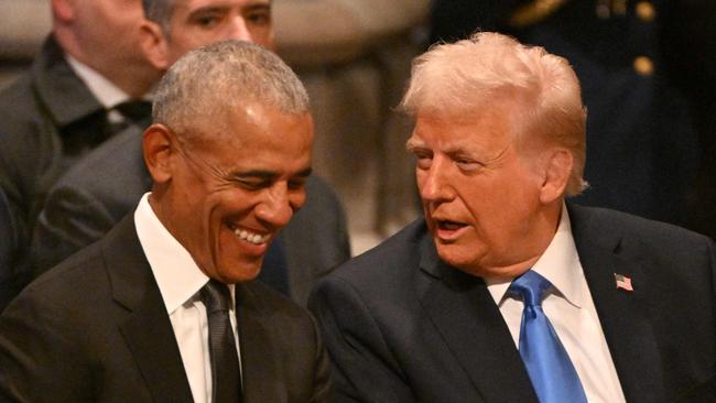 Many people were surprised to see Barack Obama and Donald Trump appearing to share a joke during Jimmy Carter’s funeral. Picture: Roberto Schmidt/AFP