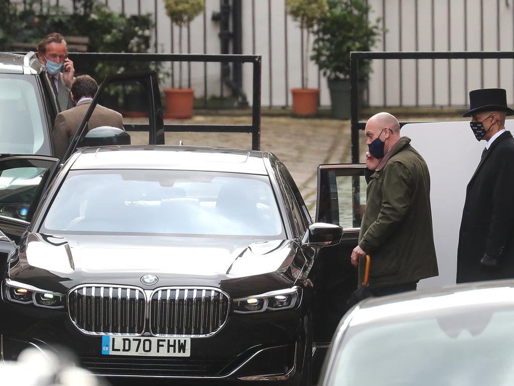 Staff ready a car at the rear entrance of King Edward VII’s Hospital. Picture: Chris Jackson/Getty Images