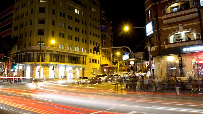 A night view of a Sydney city pub and busy street before COVID-19.