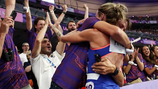 PARIS, FRANCE - AUGUST 06: Alice Finot of Team France applauds fans after competing in the Women's 3000m Steeplechase final on day eleven of the Olympic Games Paris 2024 at Stade de France on August 06, 2024 in Paris, France. (Photo by Hannah Peters/Getty Images)