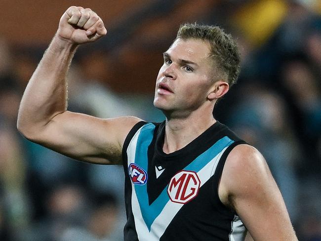 ADELAIDE, AUSTRALIA - AUGUST 03: Dan Houston of the Power  celebrates a goal  during the round 21 AFL match between Port Adelaide Power and Sydney Swans at Adelaide Oval, on August 03, 2024, in Adelaide, Australia. (Photo by Mark Brake/Getty Images)