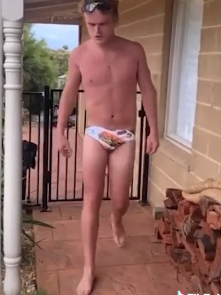 Another TikTok star Joe Woodley also jumped on the bandwagon sharing a hilarious video while modelling his new swimmers. Picture: TikTok/joeywoodley