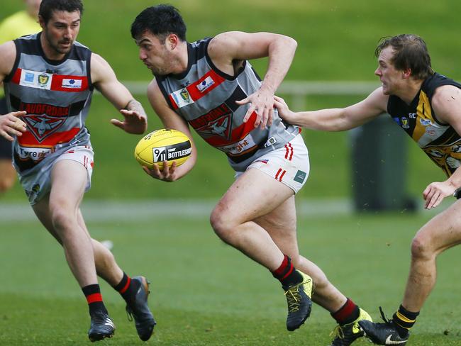 TSL Tigers Vs Lauderdale at Twin Ovals, Kingston. (L-R) Phil Bellchambers with the ball. PICTURE : MATT THOMPSON