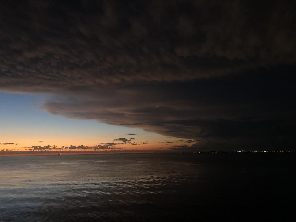 Menacing storm clouds roll across Port Phillip Bay on Thursday. Picture: Anthony Piovesan