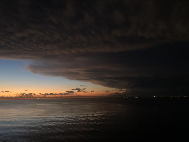 Menacing storm clouds roll across Port Phillip Bay on Thursday. Picture: Anthony Piovesan