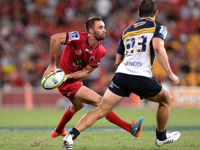 Nick Frisby of the Reds looks to pass.