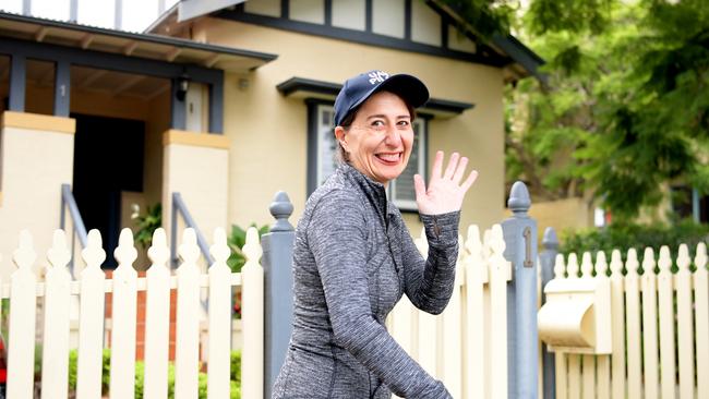 24/3/2019 Newly re elected NSW Premier Gladys Berejiklian pics up some flowers delivered by local Liberal Party member Max Menzies and walks to the local gym for a workout the morning after the NSW state election in Sydney. Tracey Nearmy/Daily Telegraph