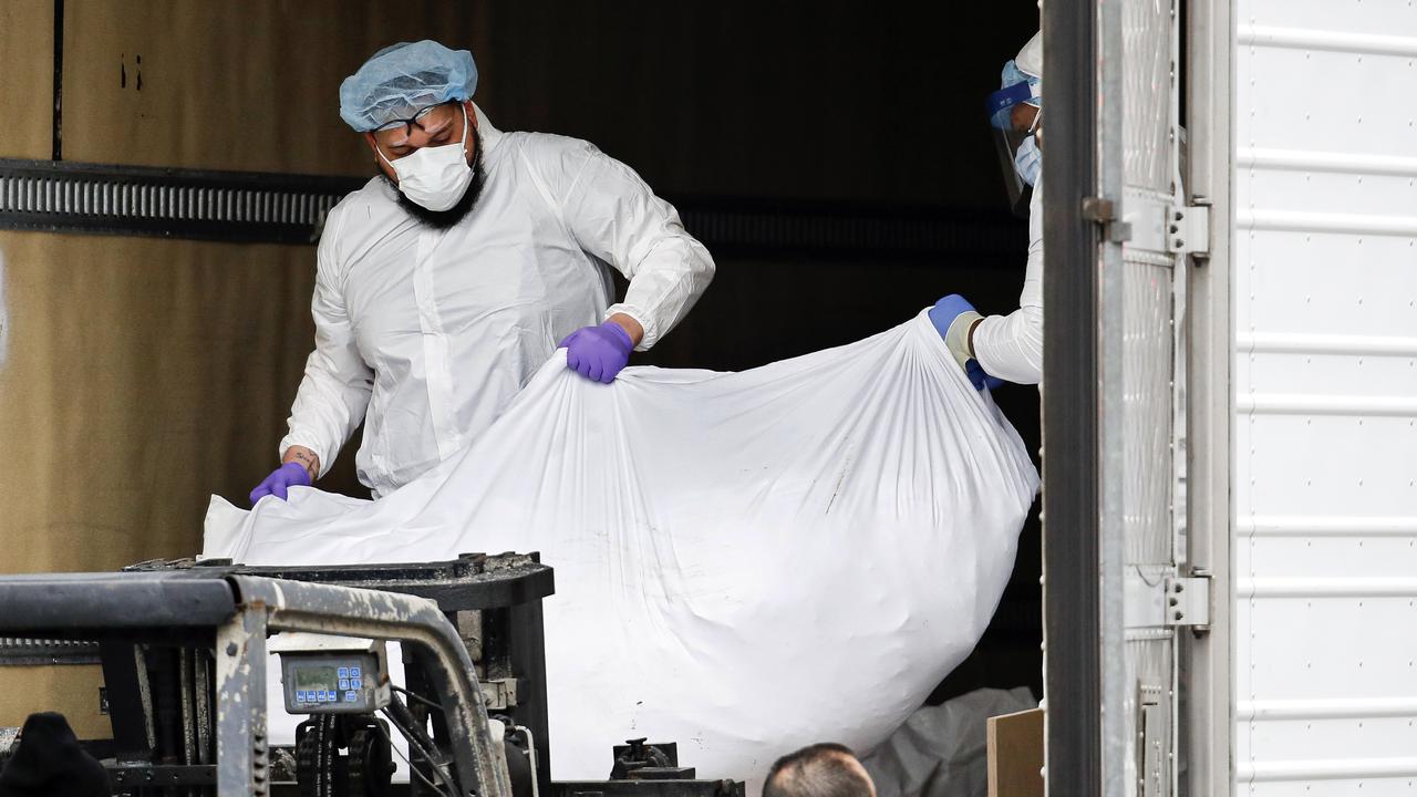 Coronavirus US: Dead Bodies Loaded Into Trucks As Death Toll Explodes ...