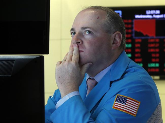 Specialist Edward Loggie on the floor of the New York Stock Exchange. Picture: AP