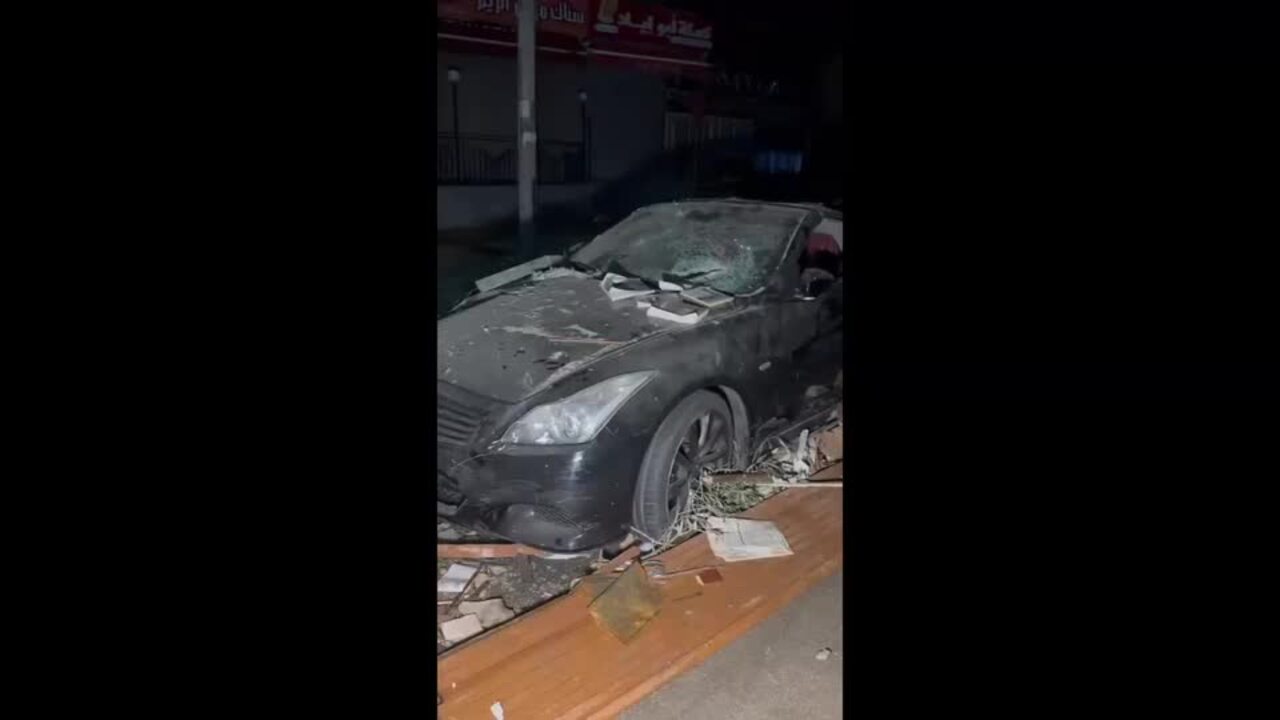 Debris, Dust Cover Vehicles in Central Beirut After Israeli Strikes