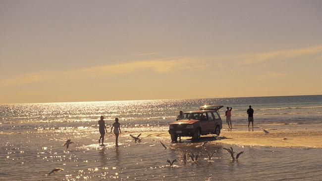 A 4WD on the beach at Hardwicke Bay.