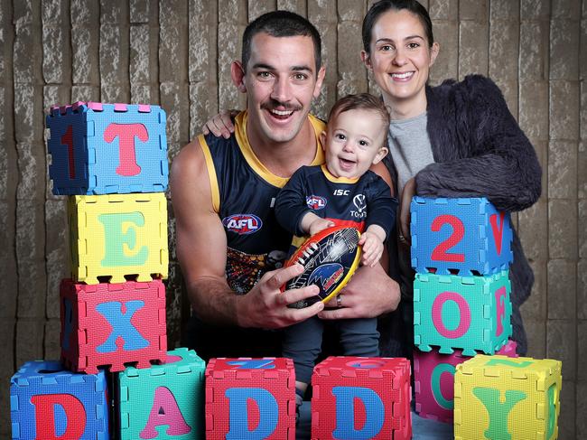 Crows forward Taylor Walker with his son Hugo and wife Ellie ahead of his 200th game. Picture: Sarah Reed