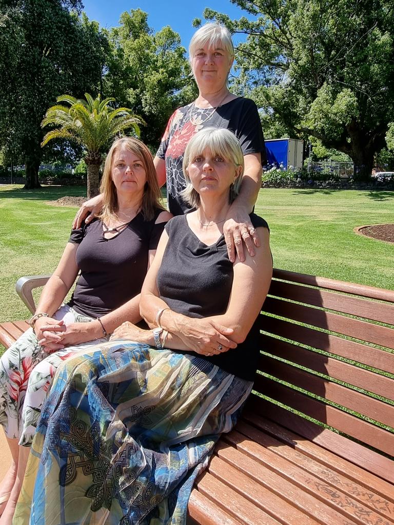 Sisters Kerrie Develyn, Susan Dodt and Jenny Vietheer (standing) want Darling Downs Health to pay for their mother Elva's rehabilitation.