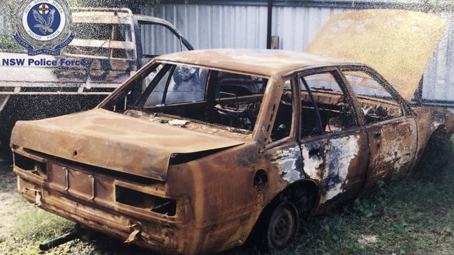 The torched Holden Commodore back in a holding yard. Picture: NSW Police.