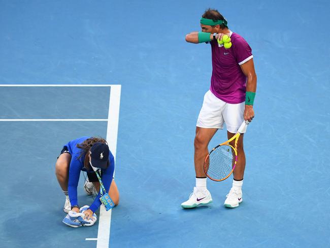 Social media is in uproar upon discovering that ballkids at the Australian Open don’t get paid. (Photo by William WEST / AFP)