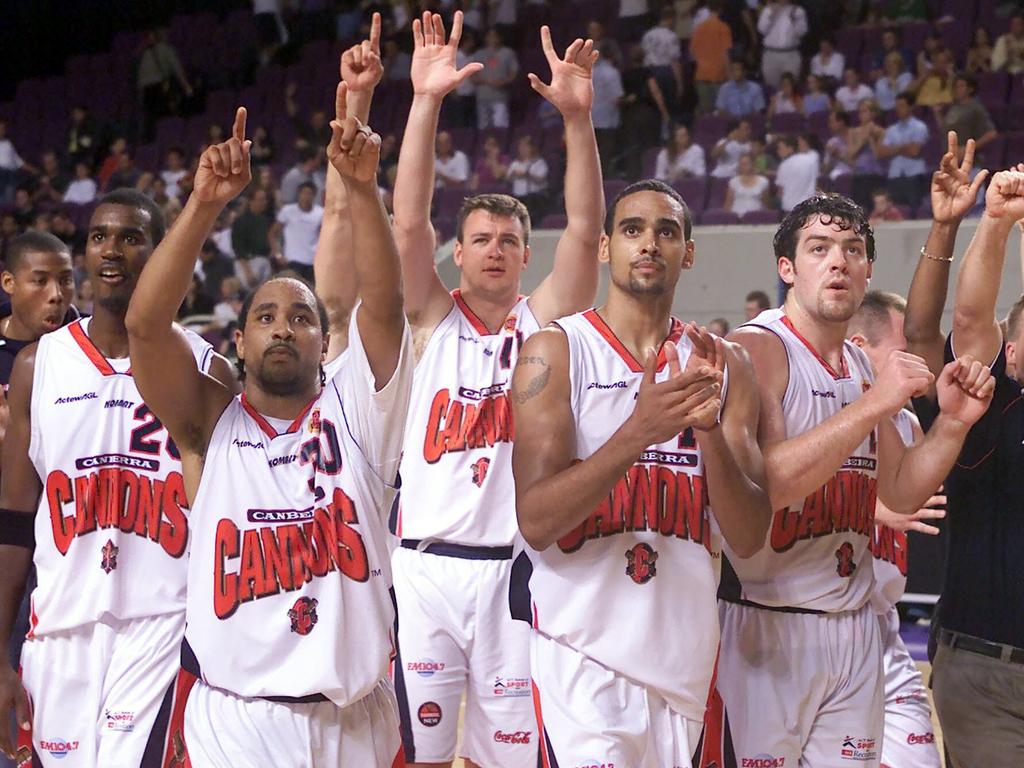 The Canberra Cannons celebrate a win over the Kings at Sydney Entertainment Centre in 2002. Picture: Basketball Australia