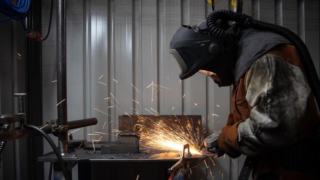 Hard at work at BAE Maritime. Picture: James Elsby.