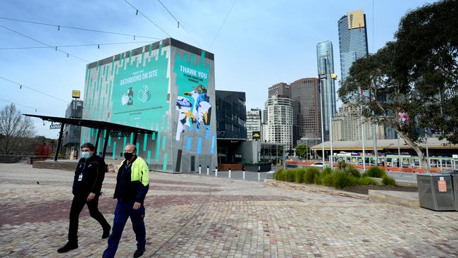 Federation Square is all but deserted. Picture: Andrew Henshaw