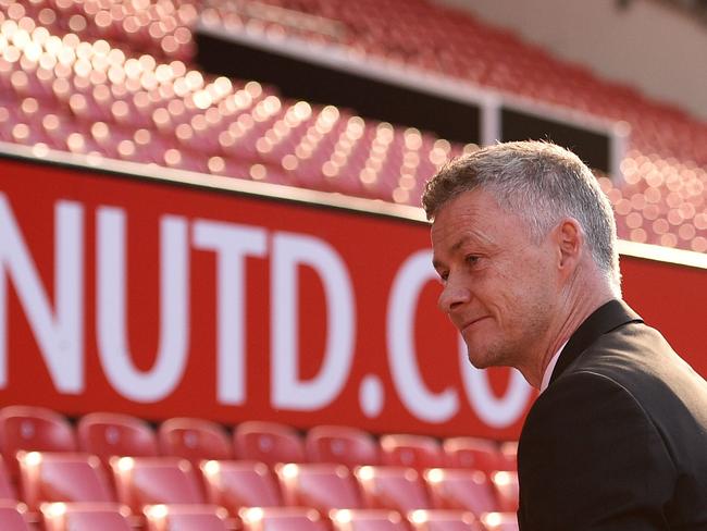 Manchester United's Norwegian manager Ole Gunnar Solskjaer is seen during a photo call at Old Trafford in Manchester, northwest England, on March 28, 2019 after it was announced that he was appointed as the club’s full-time manager on a three-year contract. - Ole Gunnar Solskjaer said he was 