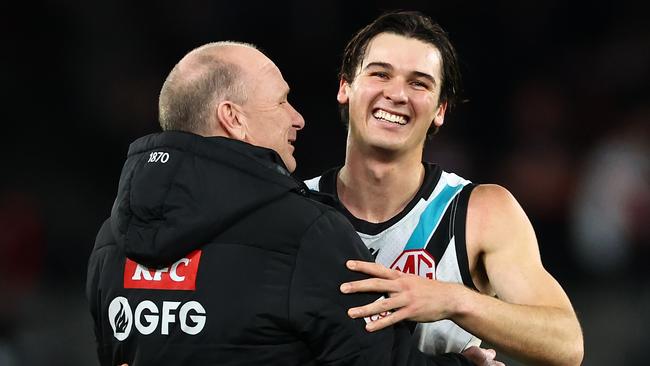 MELBOURNE, AUSTRALIA - JUNE 30: Ken Hinkley, Senior Coach of the Power and Connor Rozee of the Power celebrate winning the round 16 AFL match between St Kilda Saints and Port Adelaide Power at Marvel Stadium, on June 30, 2024, in Melbourne, Australia. (Photo by Quinn Rooney/Getty Images)