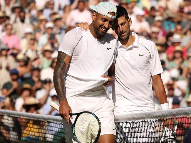 *2022 Pictures of the Year Australia* - LONDON, ENGLAND - JULY 10: Winner Novak Djokovic of Serbia (L) and runner up Nick Kyrgios of Australia interact by the net following their Men's Singles Final match day fourteen of The Championships Wimbledon 2022 at All England Lawn Tennis and Croquet Club on July 10, 2022 in London, England. (Photo by Ryan Pierse/Getty Images)