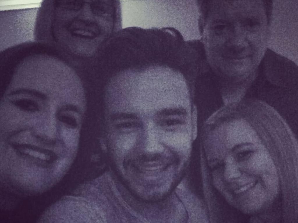 Liam with his sisters and parents Geogg and Karen.