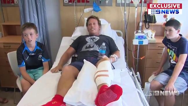 Schoolteacher Lee Jonsson was paddling out at Shelly Beach in Ballina when a 2.6m Great White savaged his leg. Picture: Nine News