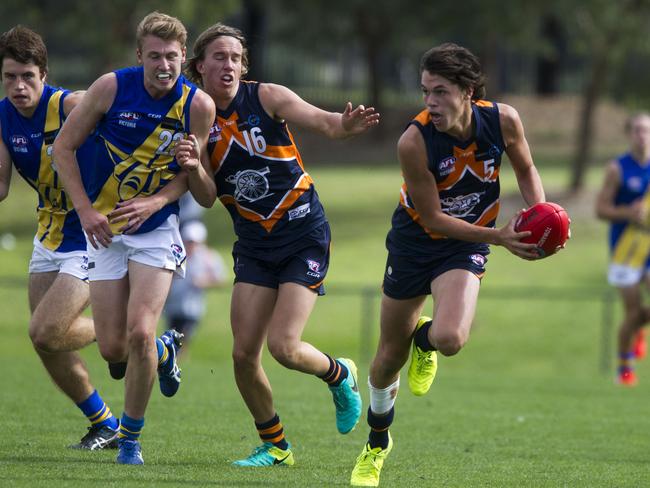 Curtis Taylor bounds away from a contest for Calder Cannons. Picture: Richard Serong