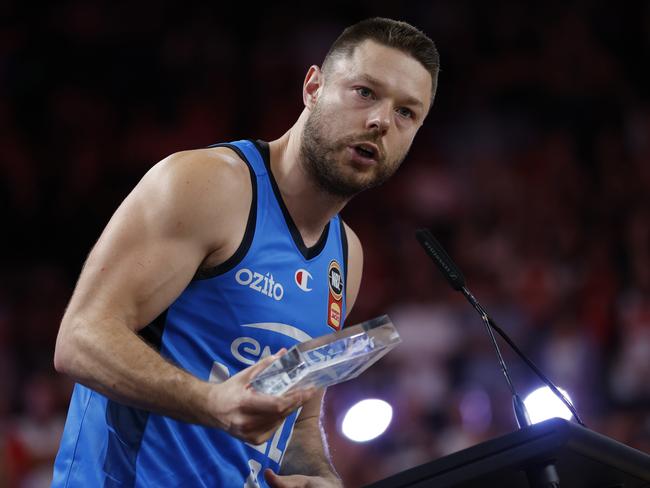 Matthew Dellavedova talks to the crowd after being awarded the Finals MVP award. Picture: Getty Images