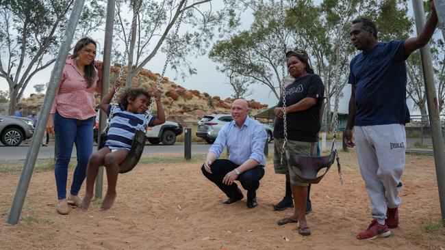 Opposition leader Peter Dutton pictured in Alice Springs, along with Senator Jacinta Price, Kerry Pearce, Curtis Haines and their youngest son Damarie.