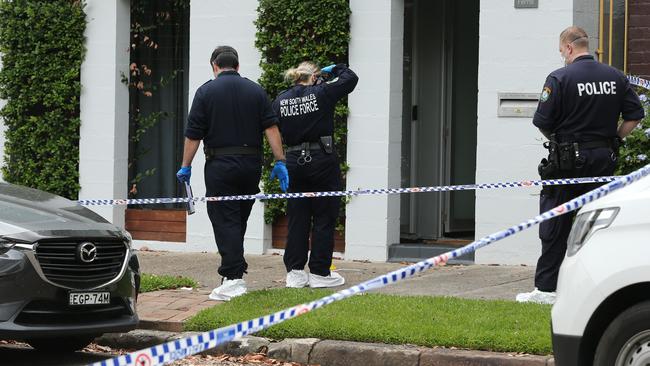 Forensic police at Karl Howard’s Annandale home where he is alleged to have lashed out with a samurai sword. Picture: Richard Dobson