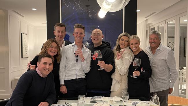 Roxy Jacenko (second from right) hires Sam Young (centre) to cook luxurious dinner for husband Oliver Curtis' 37th birthday.