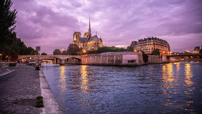 Paris' newly restored Notre-Dame cathedral viewed across the Seine.