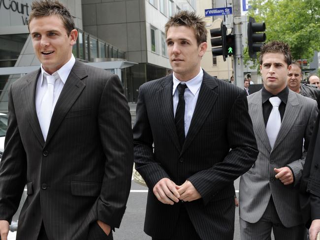 Footballers (left to right) Kade Carey, Dane Swan and Aaron Ramsay leave the County Court in 2008. Picture: News Corp