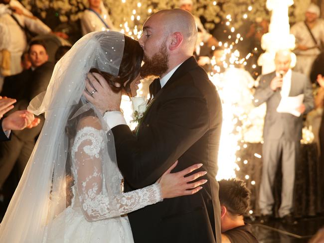 Salim Mehajer’s sister Kat and her new husband Ibraham making their entrance to their wedding reception held at Doltone House, Hyde Park. Picture: Jonathan Ng