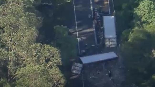 Drone footage shows the scene of a double fatal truck rollover on the Cunningham Highway at Tregony. Images: ABC News