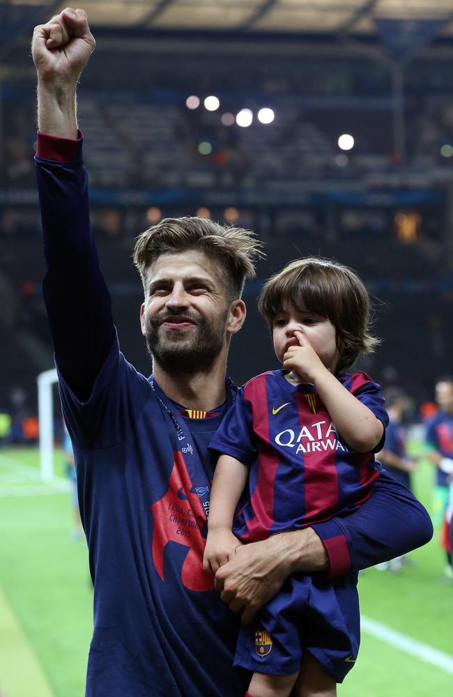 Not now, kid ... Gerard Pique of Barcelona and his son Milan celebrate the victory after the UEFA Champions League Final between Juventus Turin and FC Barcelona. Picture: Getty