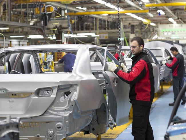 Camry manufacture ... Workers at Toyota’s car factory at Altona in May last year.