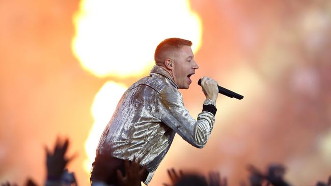 Macklemore performs before the 2017 NRL Grand Final match