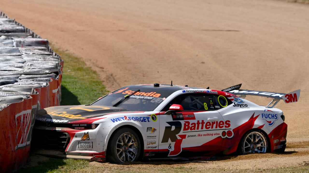 Andre Heimgartner's Brad Jones Racing Chevrolet Camaro sits in a gravel trap. (Photo by Morgan Hancock/Getty Images)