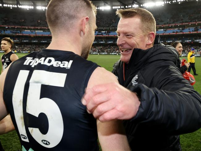 MELBOURNE, AUSTRALIA - September 8, 2023. AFL . 1st Elimination Final.    Michael Voss, senior coach of Carlton hugs Sam Docherty after the elimination final between Carlton and Sydney Swans at the MCG in Melbourne, Australia.  Photo by Michael Klein.