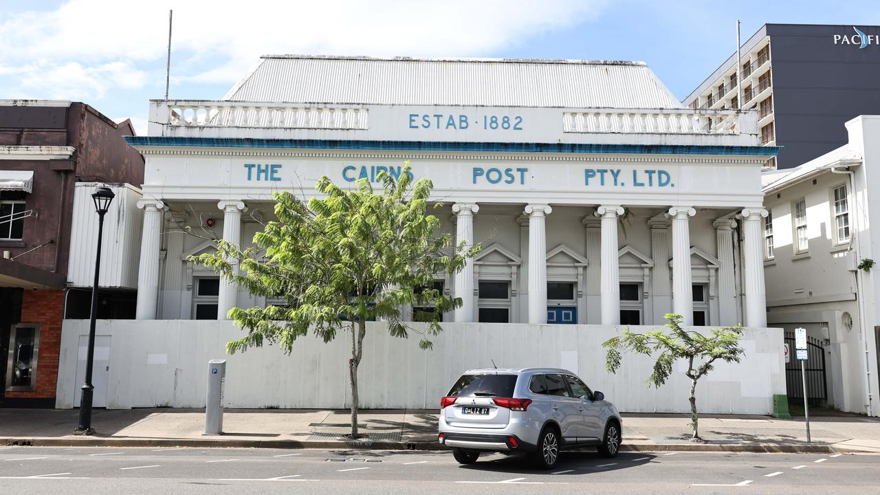 The former Cairns Post office, built in 1908 on Abbott Street, has been boarded up for years awaiting redevelopment. Mould is growing throughout the building, and vegetation has started to grow in the cracks of the famous columned facade. Picture: Brendan Radke