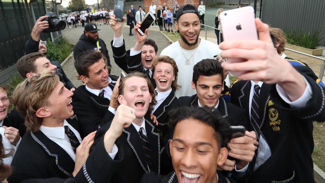 Ben Simmons with Carey Baptist Grammar School students in Kew. Picture: Alex Coppel