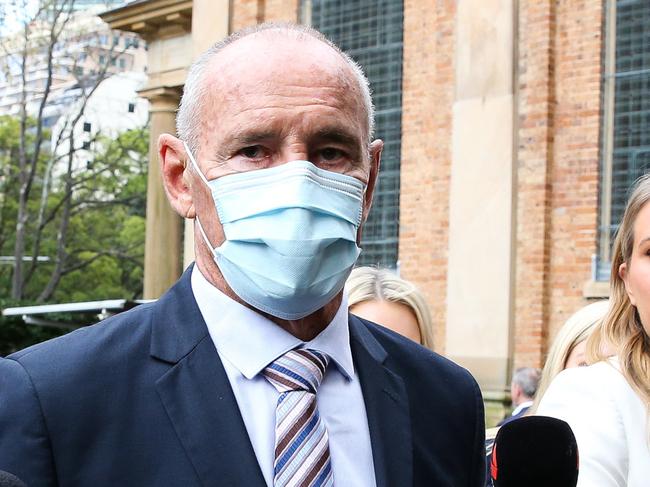 SYDNEY, AUSTRALIA - Newswire Photos - August 29, 2022: Chris Dawson (wearing blue suit) is seen arriving at the Supreme Court in Sydney as his verdict is delivered today. The former rugby league player is alleged to have murdered his wife Lynette 40 years ago. Picture NCA Newswire/ Gaye Gerard.