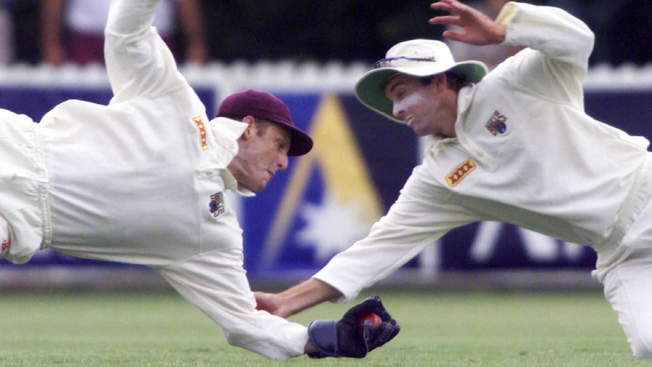 Wade Seccombe (ball) &amp; Martin Love both dive for catch. Seccombe was a superb gloveman. Pic Phil Hillyard. Cricket A/CT